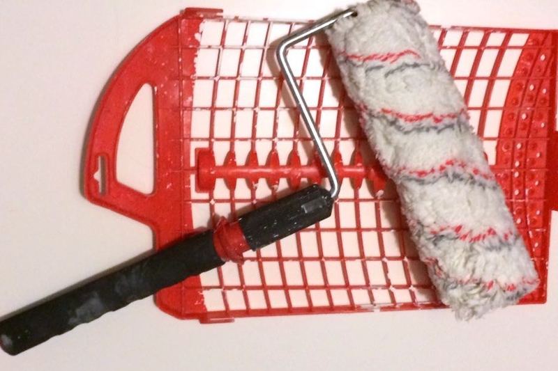 Paint roller with yellow paint