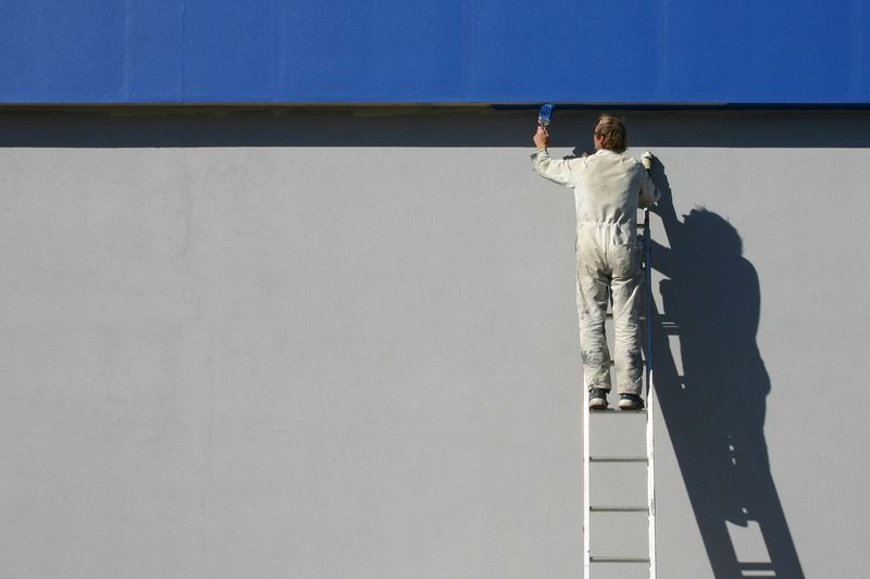 Painter at work with a brush